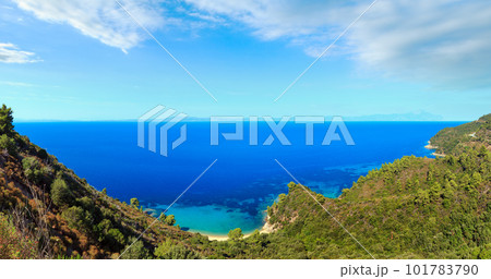 Aegean sea coast landscape and Mount Athos in mist (Chalkidiki, Greece). 101783790