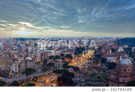 Ruins of Roman Forum. Rome City evening view from II Vittoriano top. People are unrecognizable. 101784189