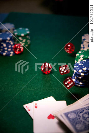 dice chips on green cloth for poker dice chips on green cloth for poker 101785511