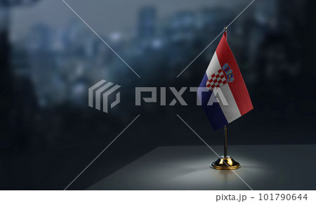 Small flags of the Croatia on an abstract blurry background 101790644