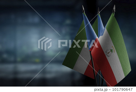 Small flags of the Equatorial Guinea on an abstract blurry background Small flags of the Equatorial Guinea on an abstract blurry background 101790647
