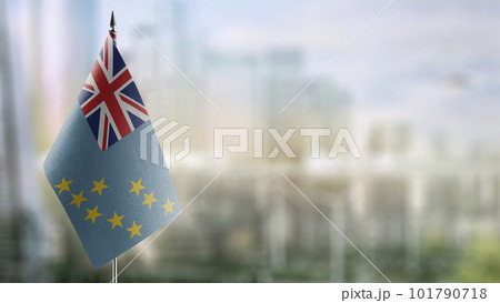 Small flags of the Tuvalu on an abstract blurry background Small flags of the Tuvalu on an abstract blurry background 101790718