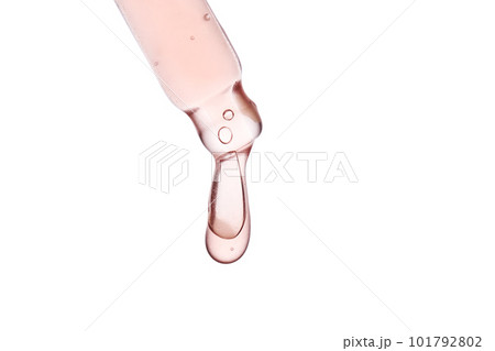 Pipette with a viscous pink cosmetic close-up. Pipette with a viscous pink cosmetic close-up. 101792802