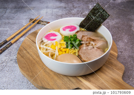 Fresh ramen noodles with garnish, pork tenderloin, eggs marinated in Mirin and soy sauce, bean 101793609