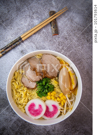 Fresh ramen noodles with garnish, pork tenderloin, eggs marinated in Mirin and soy sauce, bean Fresh ramen noodles with garnish, pork tenderloin, eggs marinated in Mirin and soy sauce, bean 101793614