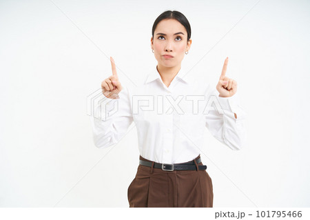 Image of female employee, office worker points finger at banner, shows promo advertisement on isolated white background Image of female employee, office worker points finger at banner, shows promo advertisement on isolated white background 101795466
