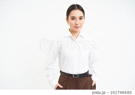Influencers and business. Confident young businesswoman with professional attitude, stands over white background 101796680