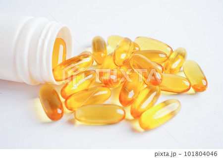 Fish oil or Cod liver oil gel in capsules with omega 3 vitamins, supplementary healthy food Fish oil or Cod liver oil gel in capsules with omega 3 vitamins, supplementary healthy food 101804046
