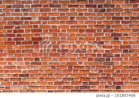 Natural old vintage weathered red brown solid brick wall. Abstract copy space background. Natural old vintage weathered red brown solid brick wall. Abstract copy space background. 101807406