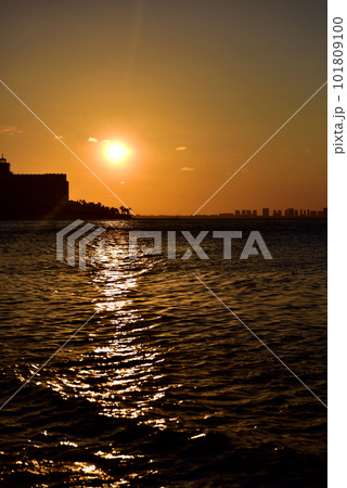 Sunrise or sunrise overlooking the sea and a line of hotels in Cancun Sunrise or sunrise overlooking the sea and a line of hotels in Cancun 101809100