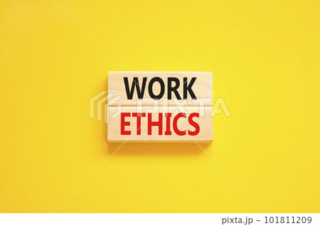Work ethics symbol. Concept words Work ethics on beautiful wooden block. Beautiful yellow table yellow background. Business and Work ethics concept. Copy space. 101811209