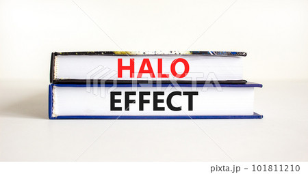 Halo effect and psychological symbol. Concept words Halo effect on beautiful books. Beautiful white table white background. Business psychological and Halo effect concept. Copy space. Halo effect and psychological symbol. Concept words Halo effect on beautiful books. Beautiful white table white background. Business psychological and Halo effect concept. Copy space. 101811210