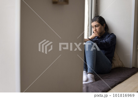 Unhappy lonely young woman suffering from apathy feels sad Unhappy lonely young woman suffering from apathy feels sad 101816969