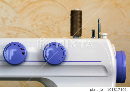 Detail of sewing machine and sewing accessories. 101817101