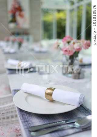 The wedding decor. Tables set for an event party or wedding reception. luxury elegant table setting dinner in a restaurant. glasses and dishes. hall for banquets and weddings. The wedding decor. Tables set for an event party or wedding reception. luxury elegant table setting dinner in a restaurant. glasses and dishes. hall for banquets and weddings. 101818976