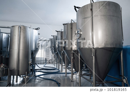 interior of modern brewery with beer fermentation tanks 101819165