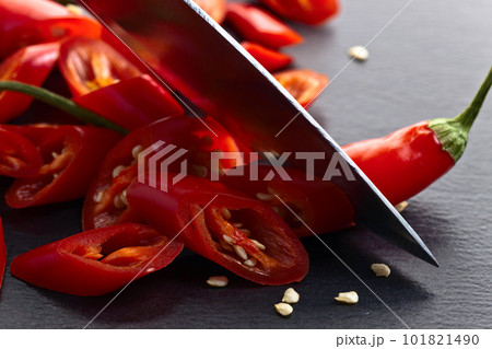 Knife and red chilli pepper Knife and red chilli pepper 101821490