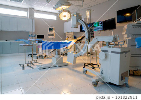 Wide shot of empty operation room with no people and view through clear mirror contain tools 101822911