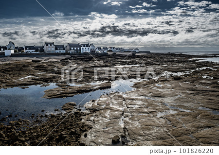 City Of Guilvinec And Stone Beach At The Finistere Atlantic Coast In Brittany, France City Of Guilvinec And Stone Beach At The Finistere Atlantic Coast In Brittany, France 101826220
