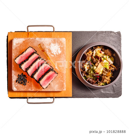 Red tuna rolled in black sesame seeds 101828888