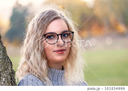 Portrait of young blond woman in glasses Portrait of young blond woman in glasses 101834999