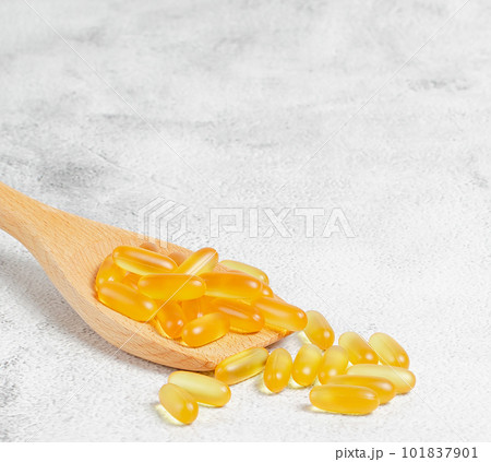 Alternative natural medicine. Omega 3 and Turmeric. Superfood, detox or diet concept. Background layout with free text space. Stock photo.	 101837901