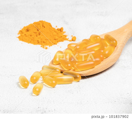 Alternative natural medicine. Omega 3 and Turmeric. Superfood, detox or diet concept. Background layout with free text space. Stock photo.	 101837902
