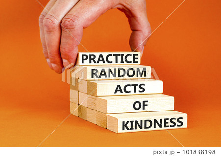 Practice random kind of kindness symbol. Concept words Practice random kind of kindness on wooden block. Beautiful orange background. Businessman hand. Business practice kindness concept. Copy space. Practice random kind of kindness symbol. Concept words Practice random kind of kindness on wooden block. Beautiful orange background. Businessman hand. Business practice kindness concept. Copy space. 101838198