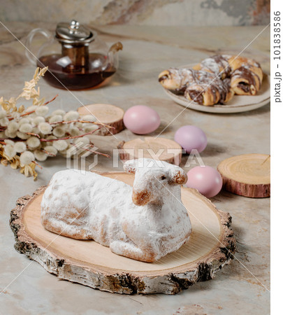 Easter sweet lamb cake, eggs, willow, wood on old vintage background	 101838586
