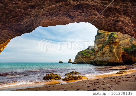 Natural caves and sea beach, Algarve Portugal 101839138
