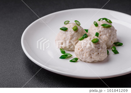 Delicious healthy steamed chicken cutlets or minced meatballs 101841209