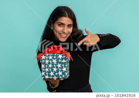 Indian woman presenting birthday gift box offer wrapped present career bonus celebrating party, sale 101842916