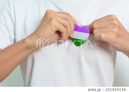 Queer Pride Day and LGBT pride month concept. purple, white and green heart shape for Lesbian, Gay, Bisexual, Transgender, genderqueer and Pansexual community 101854130
