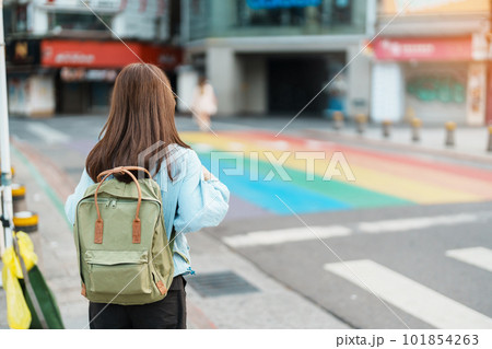woman traveler visiting in Taiwan, Tourist sightseeing at rainbow crosswalk in ximending, Taipei City. landmark and popular attractions. Asia Travel, Trip and Vacation concept woman traveler visiting in Taiwan, Tourist sightseeing at rainbow crosswalk in ximending, Taipei City. landmark and popular attractions. Asia Travel, Trip and Vacation concept 101854263