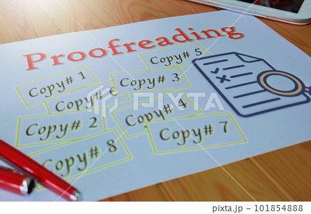 proofreading paper on wooden table proofreading paper on wooden table 101854888