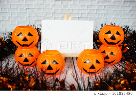Halloween Pumpkin bucket  with space copy on wooden background 101855480