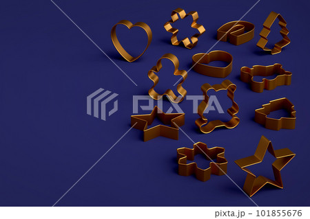 Set of metal cookie cutters for homemade Christmas biscuit on a blue background Set of metal cookie cutters for homemade Christmas biscuit on a blue background 101855676