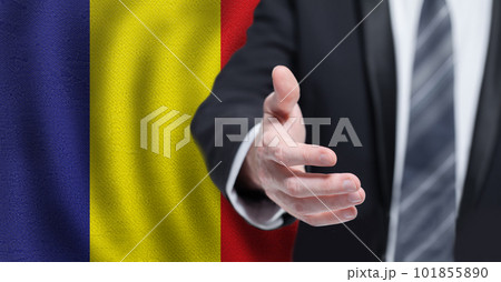 Romanian business, politics, cooperation and travel concept. Hand on flag of Romania background. Romanian business, politics, cooperation and travel concept. Hand on flag of Romania background. 101855890