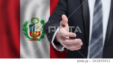 Peruvian business, politics, cooperation and travel concept. Hand on flag of Peru background. 101855911