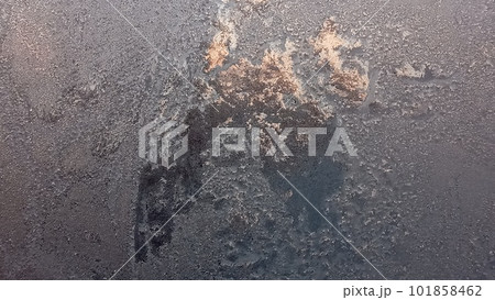 Frost and sun background. Frost texture on the window glass in winter. Ice Crystals in Winter Blue and Pink. 101858462