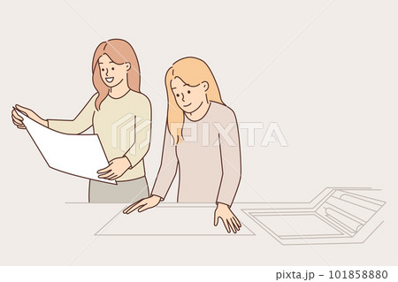 Women work in printing factory and scan image using copy equipment to reproduce advertising flyers 101858880