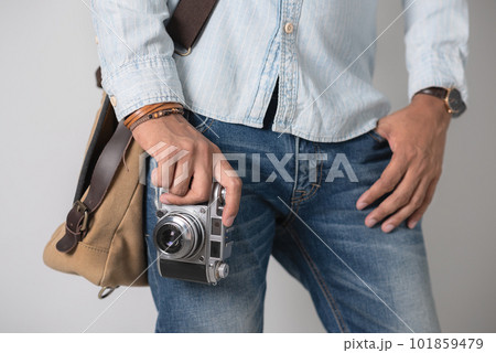 Retro camera in hand 101859479