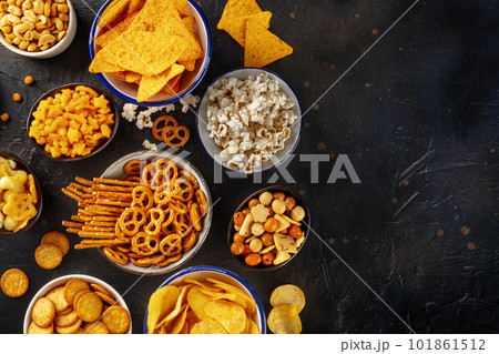 Salty snacks, party mix, overhead flat lay shot with copy space 101861512