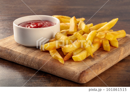 French fries, potato snack with ketchup, fast food 101861515