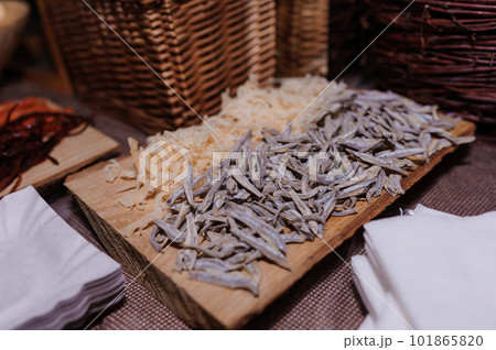 Various types of fish snacks on the festive table. Anchovies 101865820