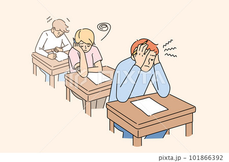 Anxious students write test in classroom Anxious students write test in classroom 101866392