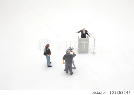 a figure of journalists , cameraman ,Videographer at work shooting 101868347