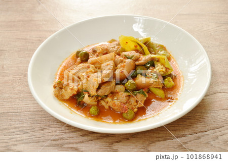 spicy stir fried slice pork leg with eggplant curry on plate  101868941