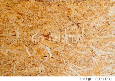 OSB is a building material made of wood chips and resin. 101871251