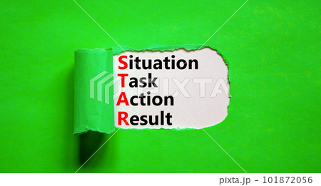 STAR situation task action result symbol. Concept words STAR situation task action result on white paper on beautiful green background. Business STAR situation task action result concept. Copy space 101872056